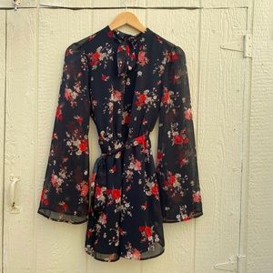 Black floral dress with roses longsleeve high neck with tie.